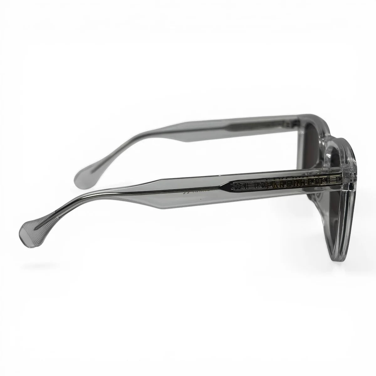 The Veyra bold rectangle sunglasses in Clear and Brown, side profile view