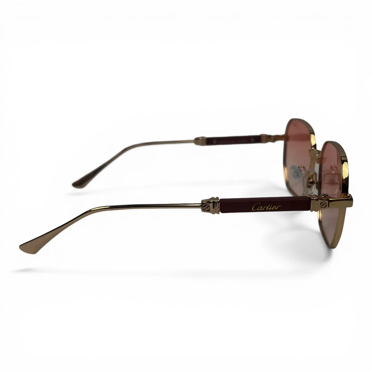 The Aurel geometric sunglasses in gold and brown with rose gradient lenses, side profile view