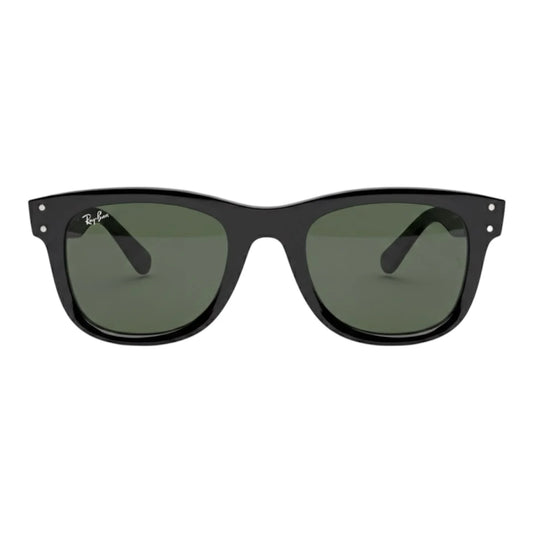 Black sunglasses with green lenses on a white background