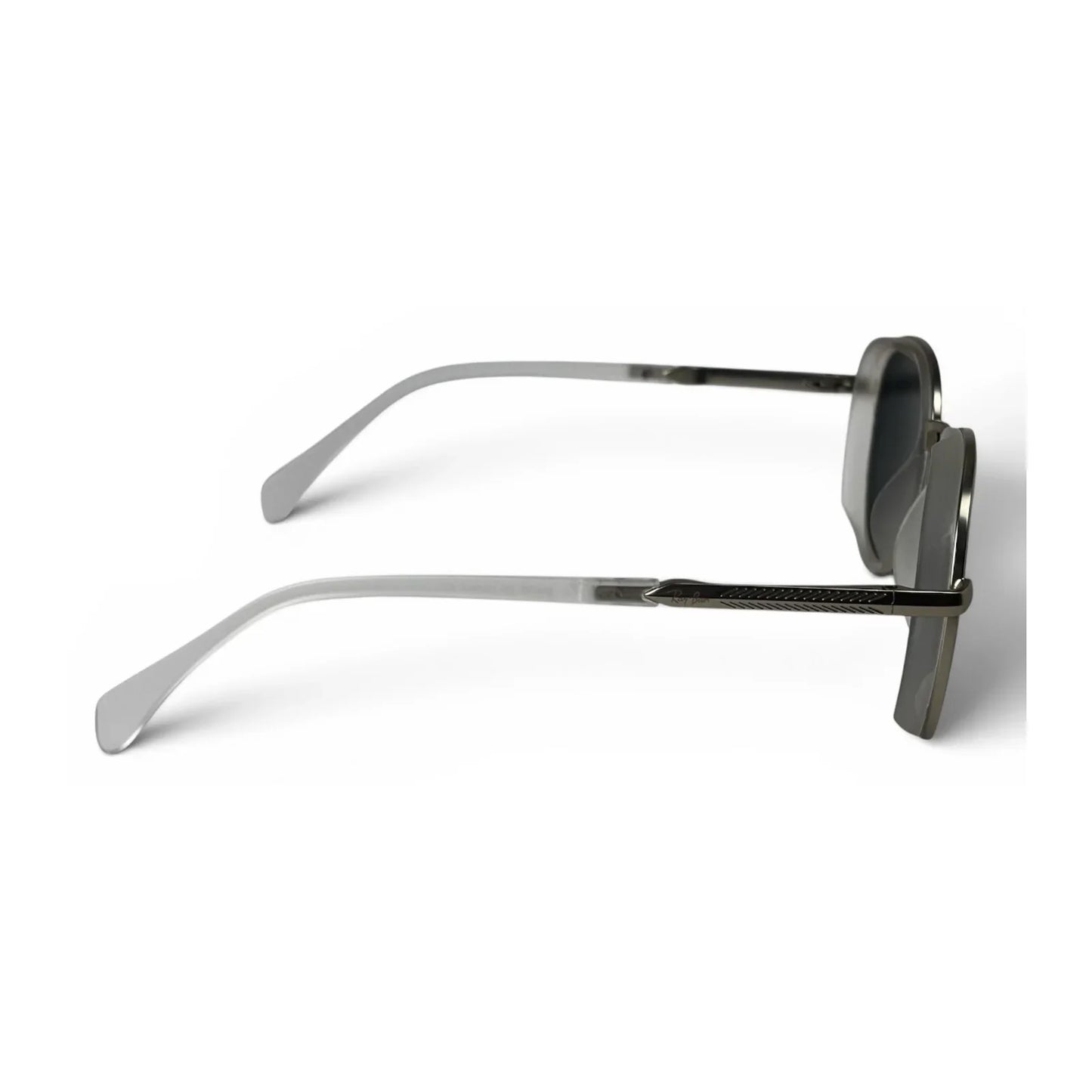 The Lumen round sunglasses in clear with black lenses, side profile view