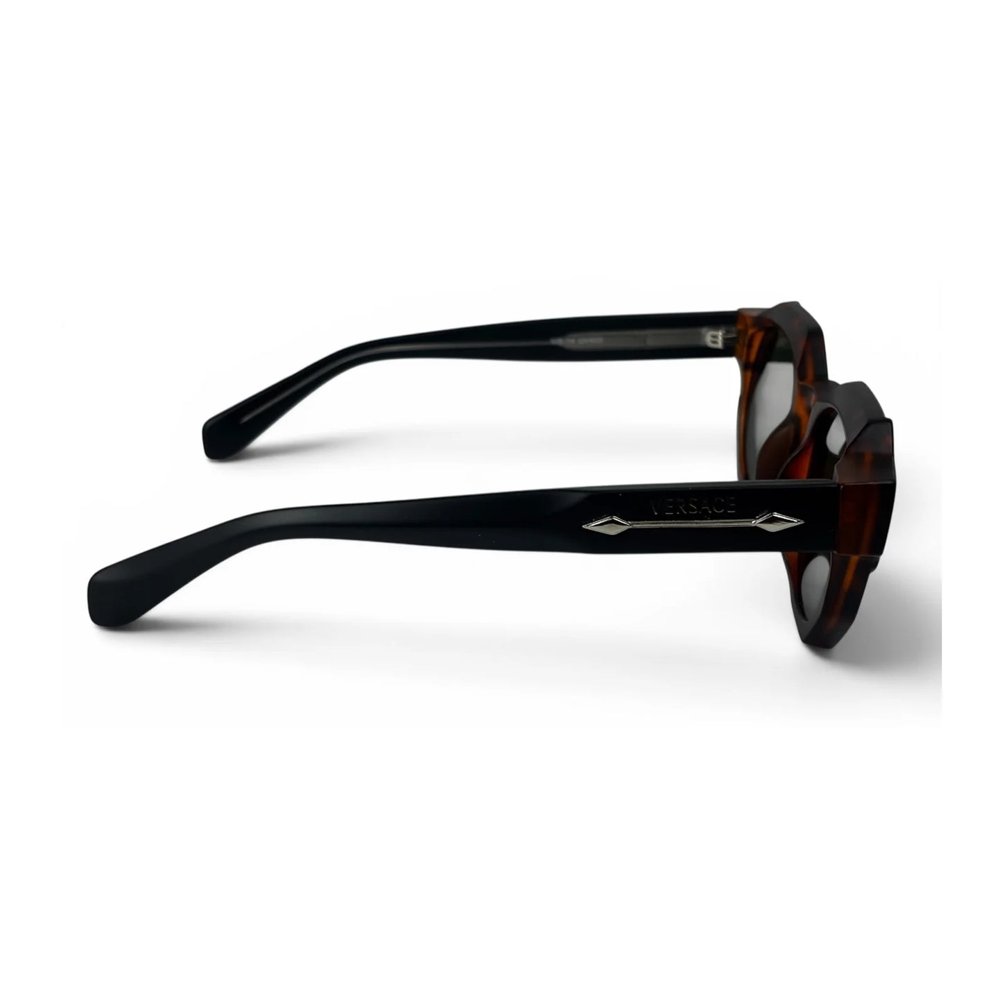 The Monolith chunky octagon sunglasses in tortoise with olive lenses, side view