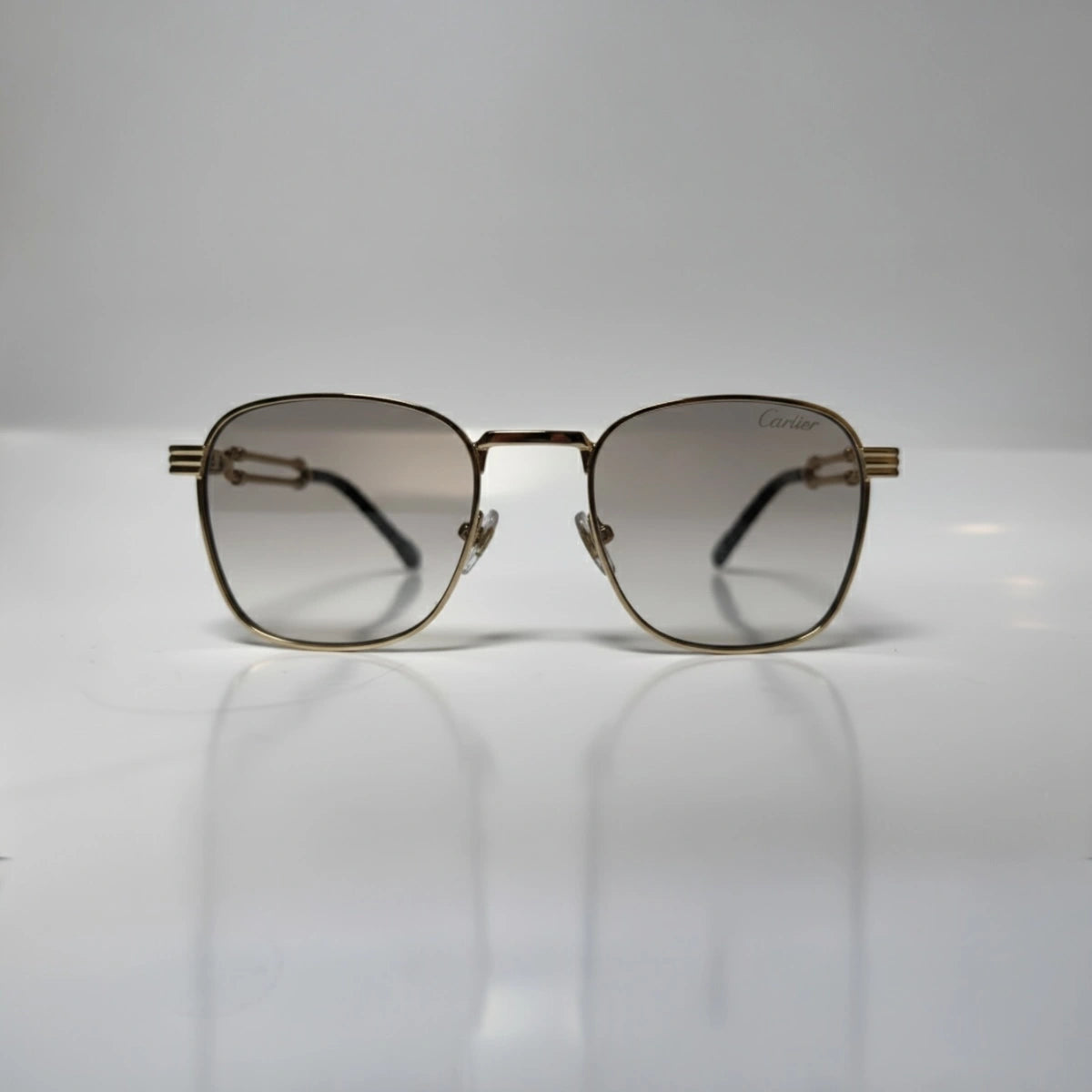 The ‘Mounir’ Rectangle Sunglasses | Transparent & Gold