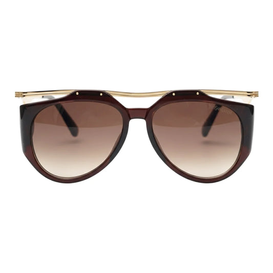 Sunglasses with gold frame and brown gradient lenses on a white background
