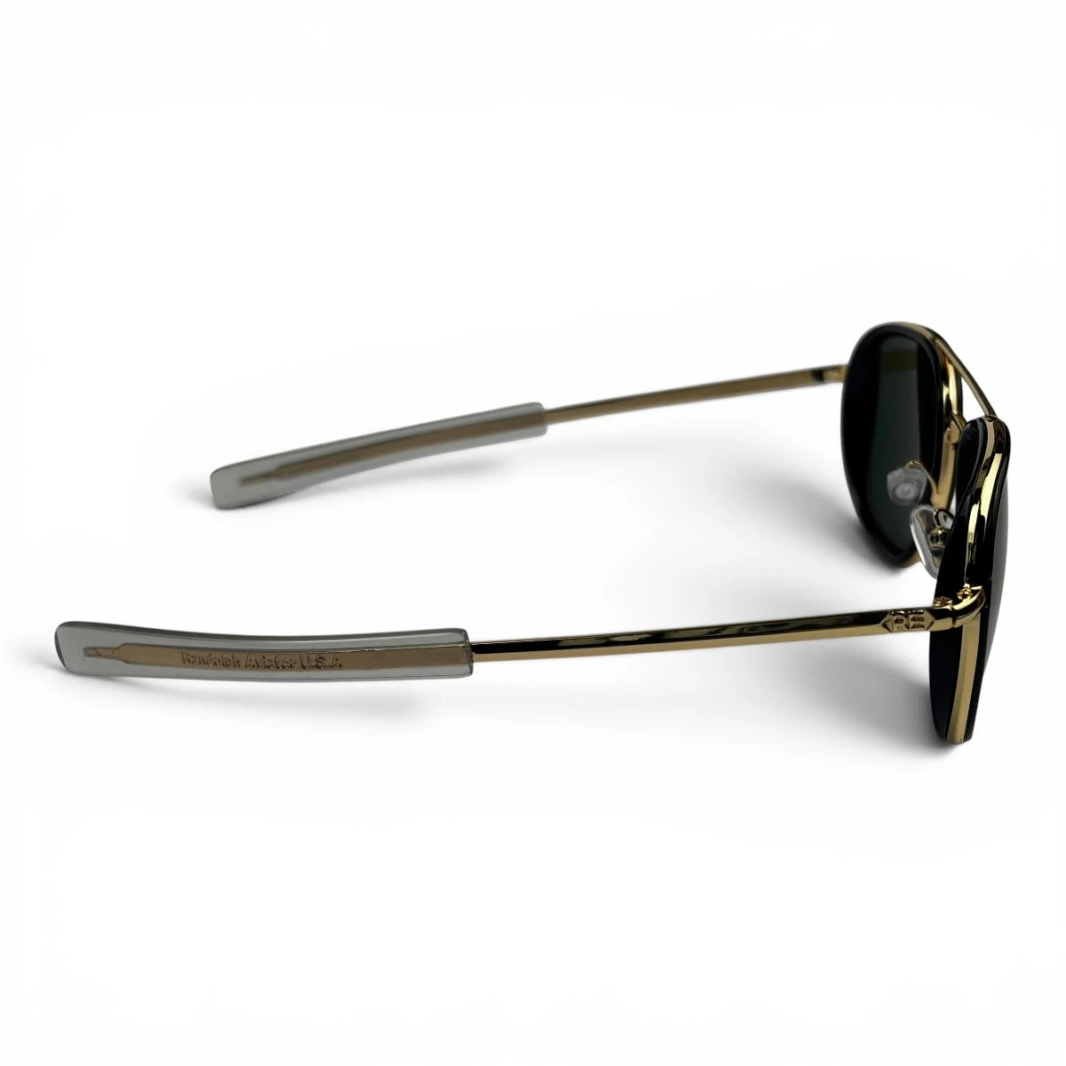 The Rayan Metal Rectangle sunglasses in Gold with Green lenses, side profile view