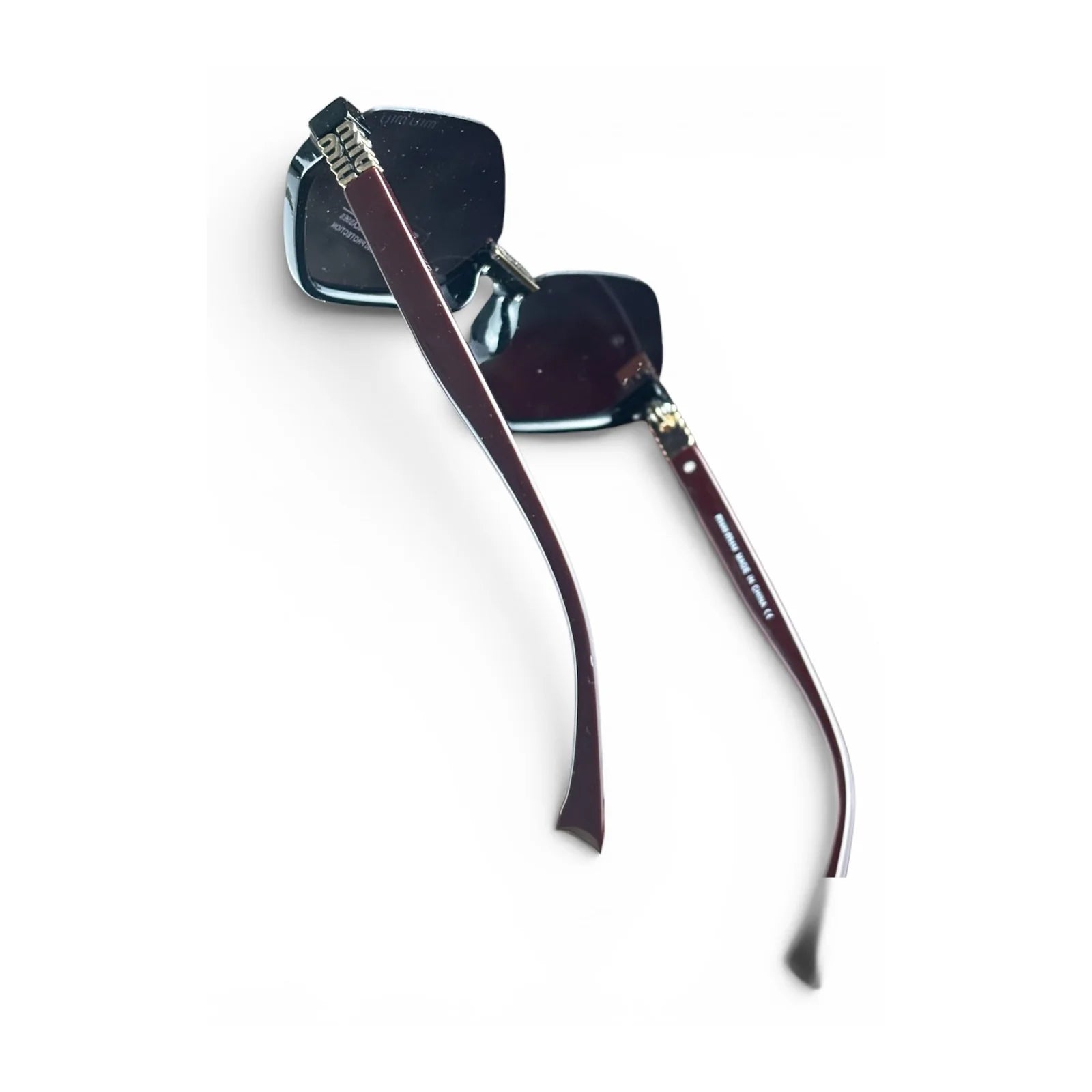 Apex compact semi-rimless geometric sunglasses in Amber and Black, side detail view