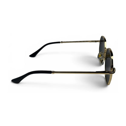 The Facet geometric rimless sunglasses in gold and black with black lenses, side profile view