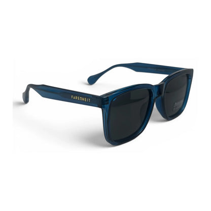 The Veyra bold rectangle sunglasses in Transparent Blue and Dark Gray, angled three-quarter view