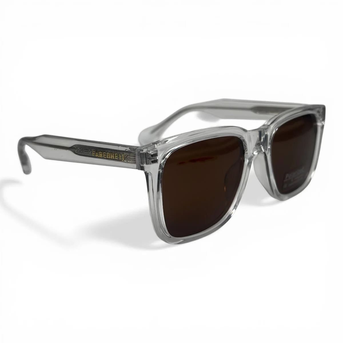 The Veyra bold rectangle sunglasses in Clear and Brown, angled three-quarter view