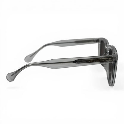 The Veyra bold rectangle sunglasses in Clear and Brown, side profile view