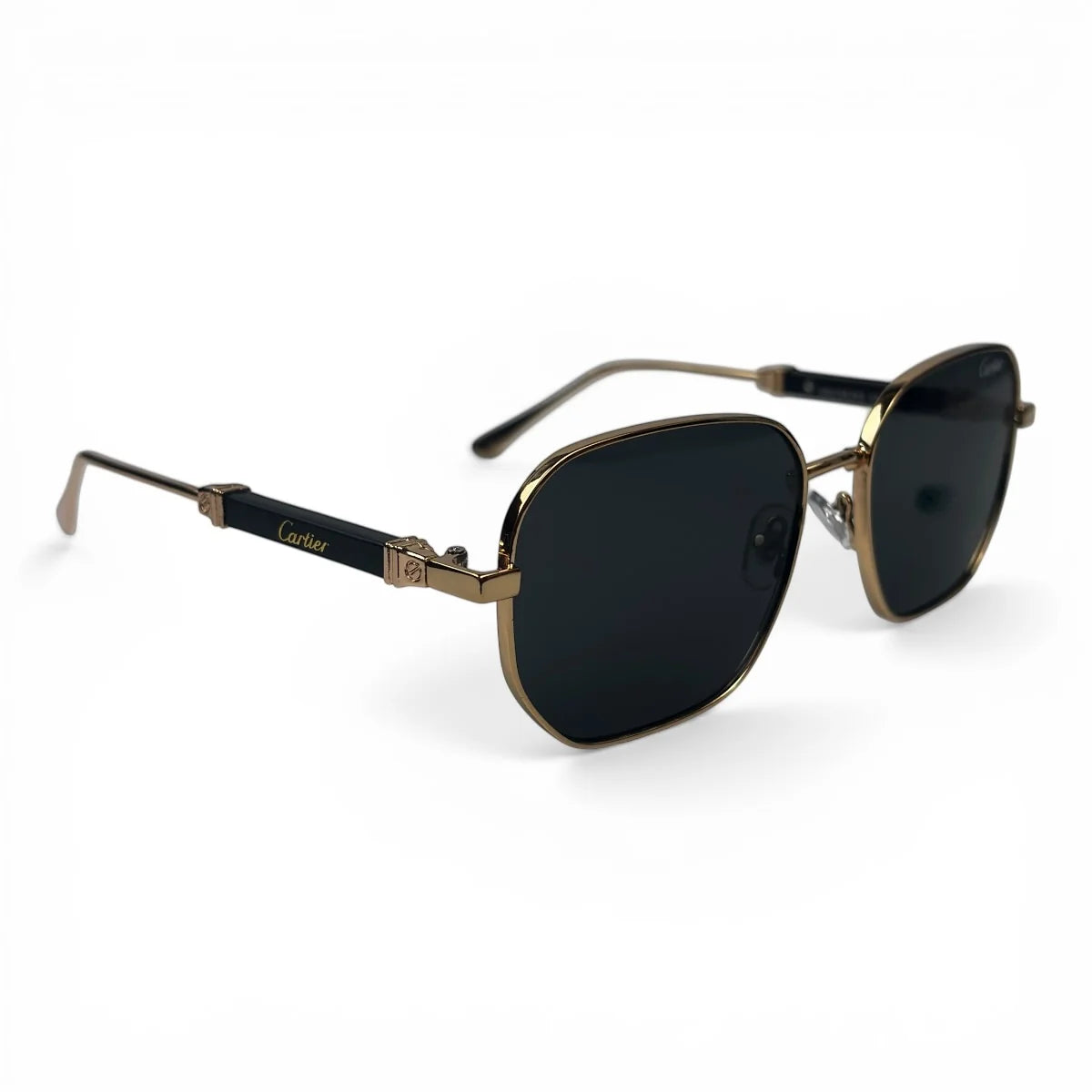 The Aurel geometric sunglasses in gold and brown with dark gray lenses, angled view