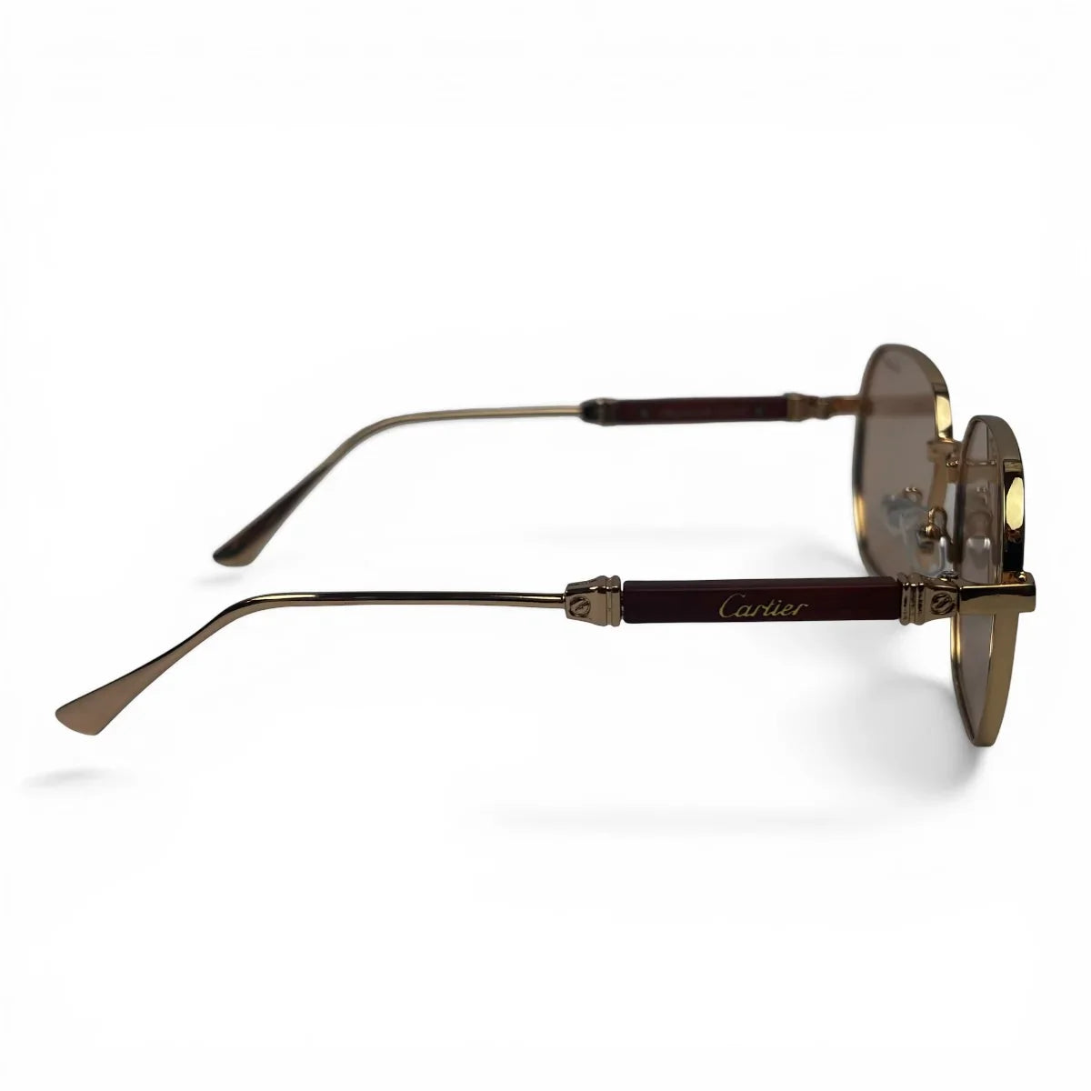 The Aurel geometric sunglasses in gold and brown with taupe lenses, side profile view