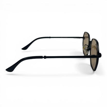 The Facet geometric rimless sunglasses in black and gold with champagne lenses, side profile view