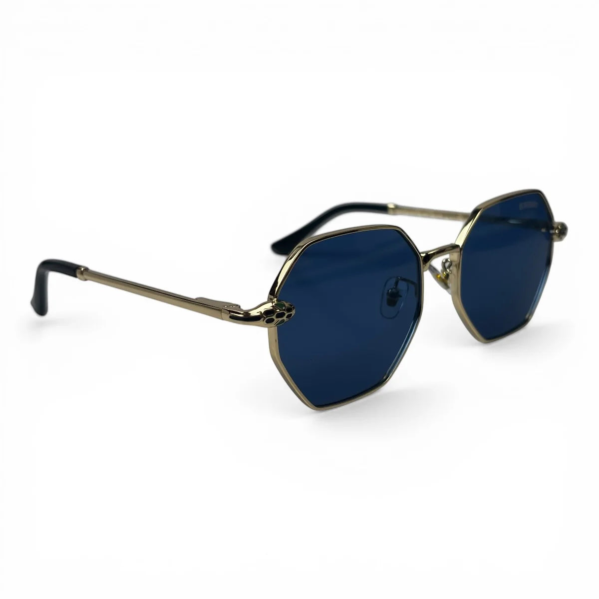 The Facet geometric rimless sunglasses in gold and black with blue lenses, angled view