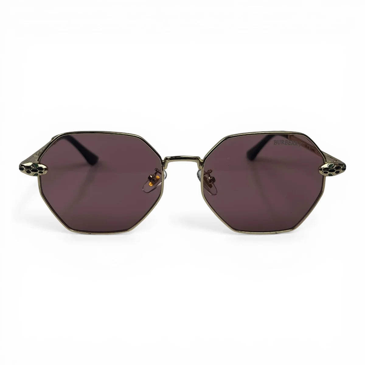 The Facet geometric rimless sunglasses in gold and black with rose lenses, front view
