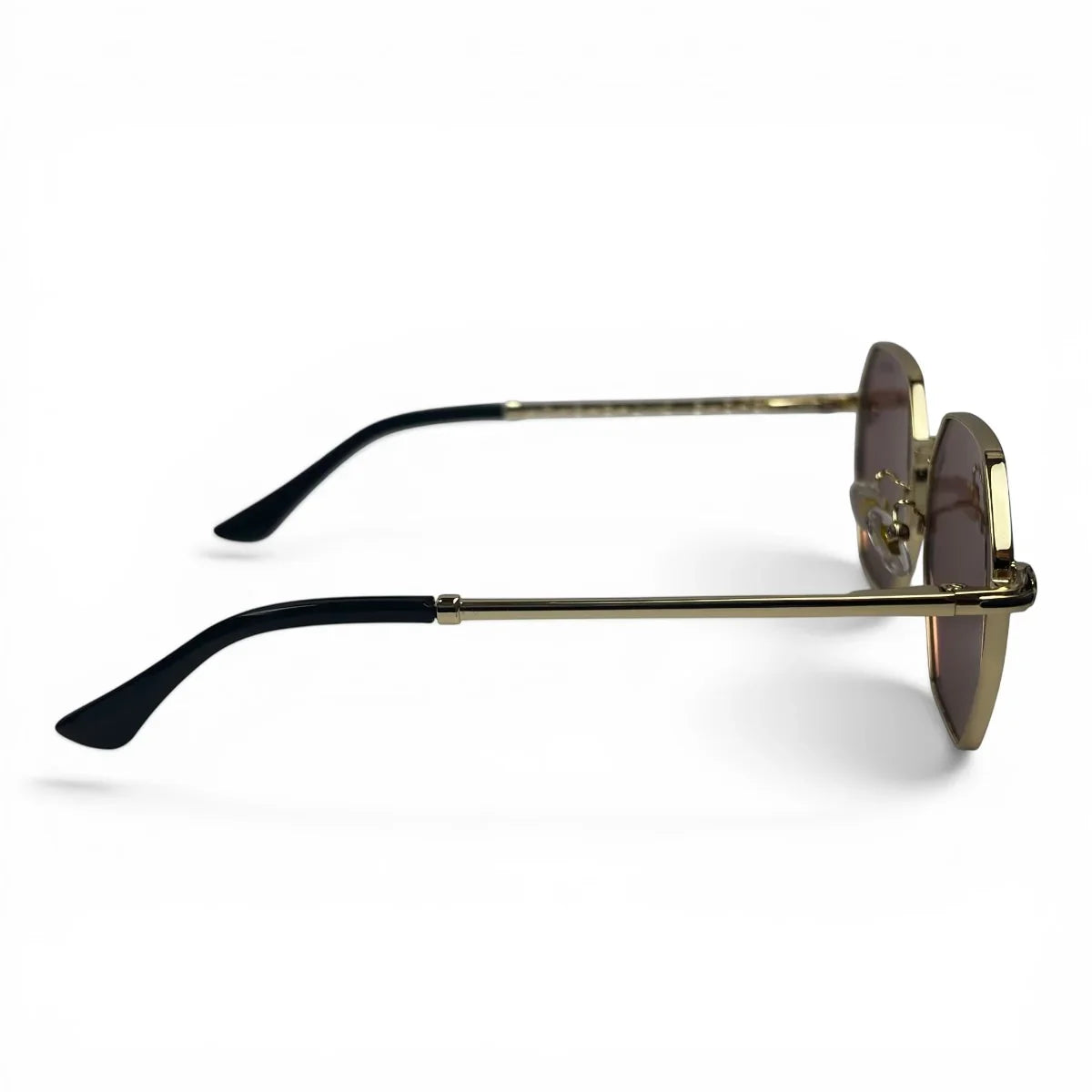The Facet geometric rimless sunglasses in gold and black with rose lenses, side profile view