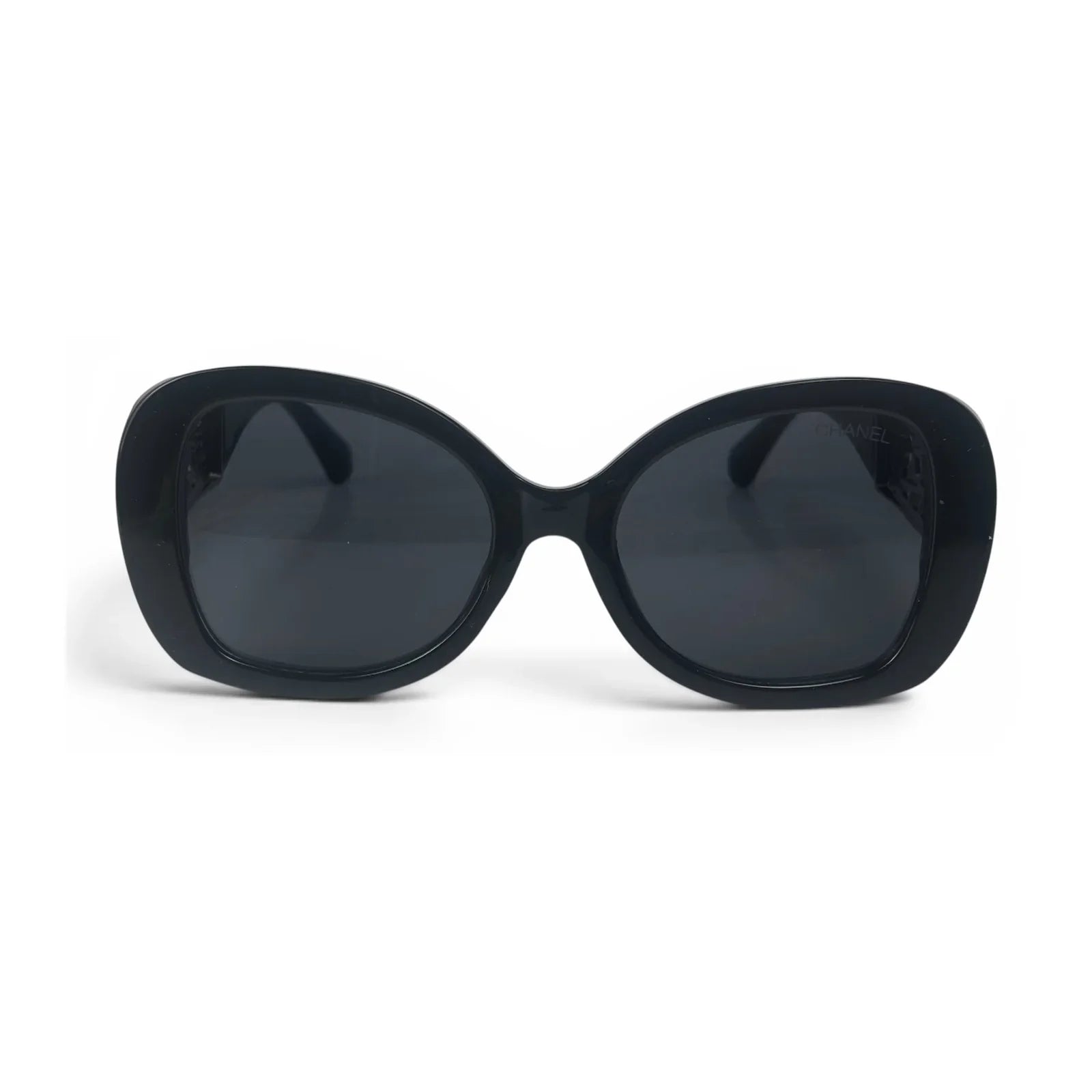 The Filigree oversized round sunglasses in black silver with dark gray lenses, front view