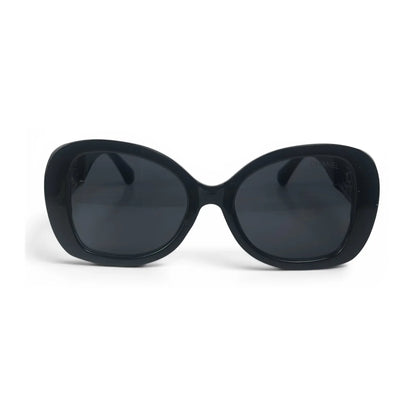 The Filigree oversized round sunglasses in black silver with dark gray lenses, front view
