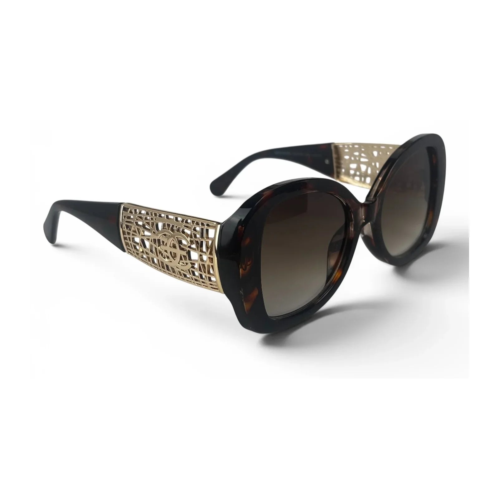 The Filigree oversized round sunglasses in tortoise gold with olive lenses, angled view