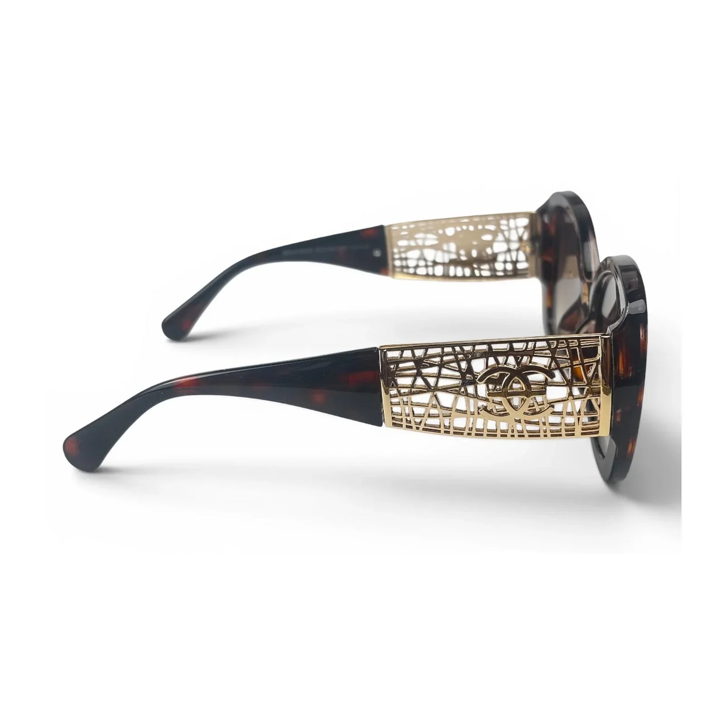 The Filigree oversized round sunglasses in tortoise gold with olive lenses, side view