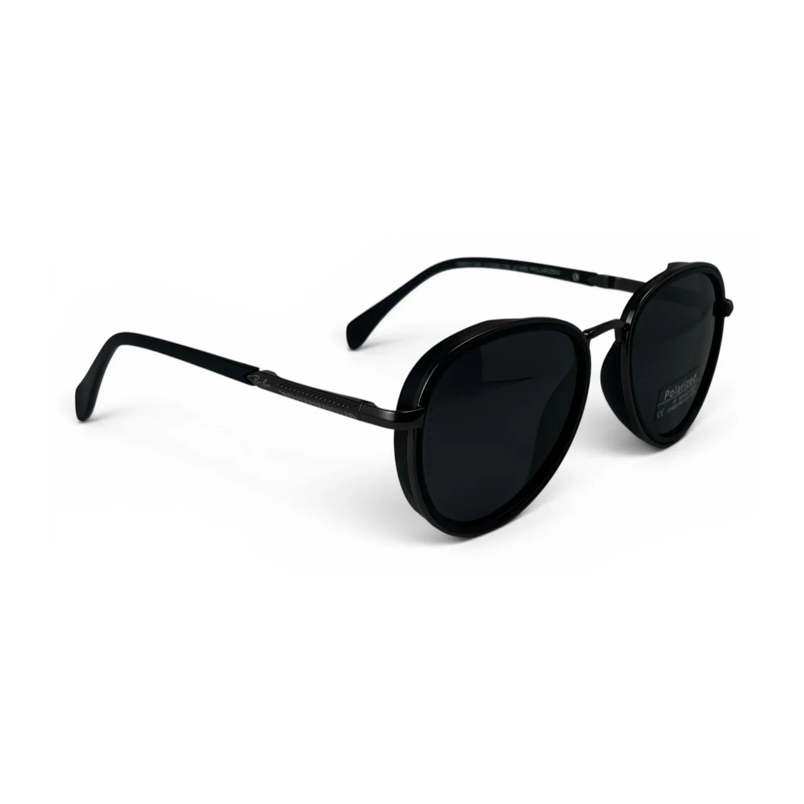 The Lumen round sunglasses in black with black lenses, angled three-quarter view