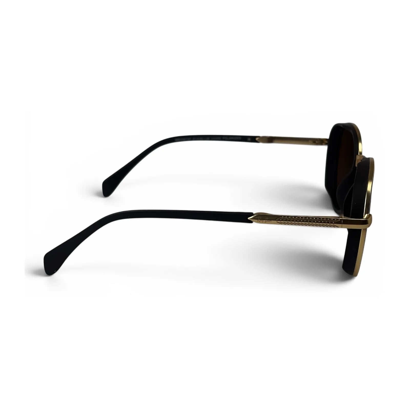The Lumen round sunglasses in gold with brown lenses, side profile view