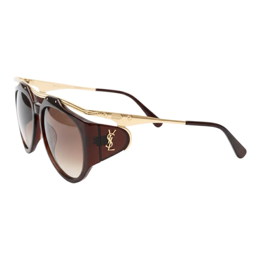 Sunglasses with gold frame and brown lenses on a white background