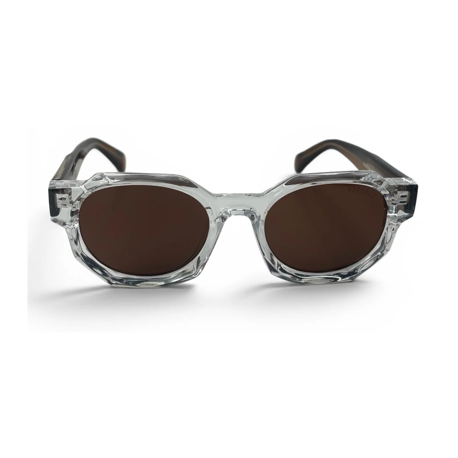 The Monolith chunky octagon sunglasses in crystal clear with brown lenses, front view