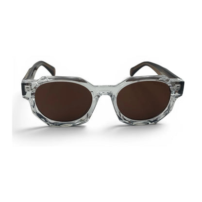 The Monolith chunky octagon sunglasses in crystal clear with brown lenses, front view