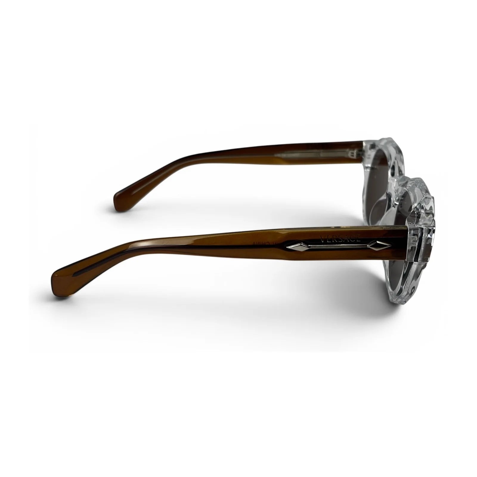 The Monolith chunky octagon sunglasses in crystal clear with brown lenses, side view