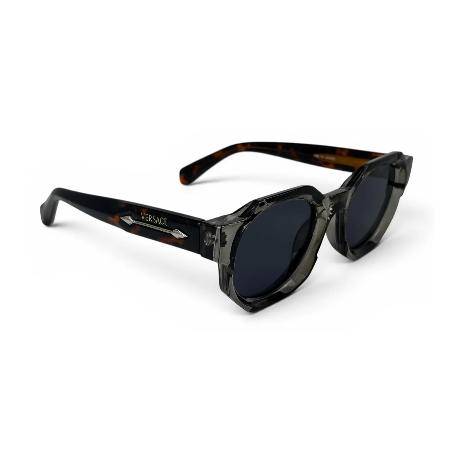 The Monolith chunky octagon sunglasses in smoke gray with tortoise temples and dark gray lenses, angled view