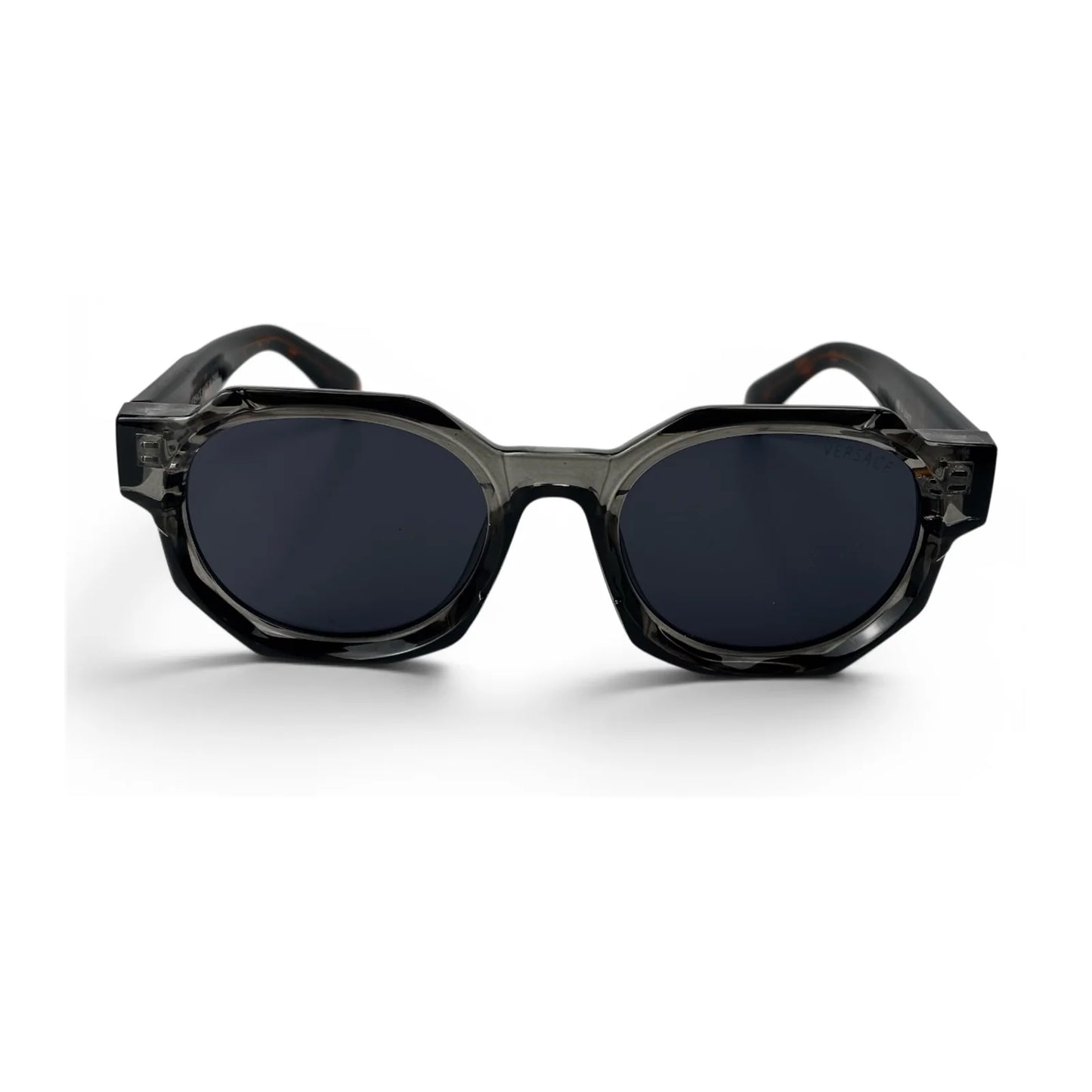 The Monolith chunky octagon sunglasses in smoke gray with tortoise temples and dark gray lenses, front view