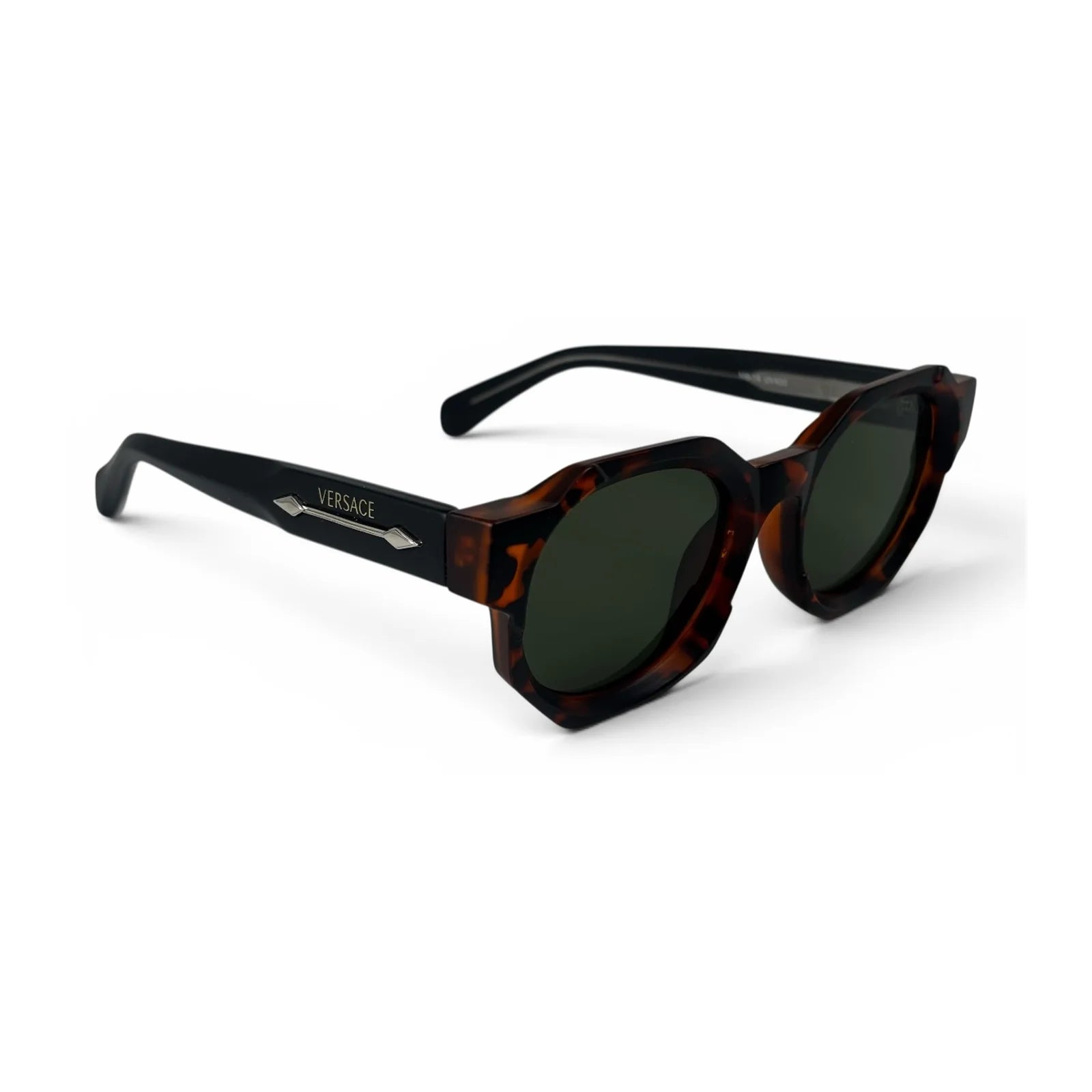 The Monolith chunky octagon sunglasses in tortoise with olive lenses, angled view