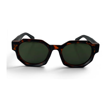The Monolith chunky octagon sunglasses in tortoise with olive lenses, front view
