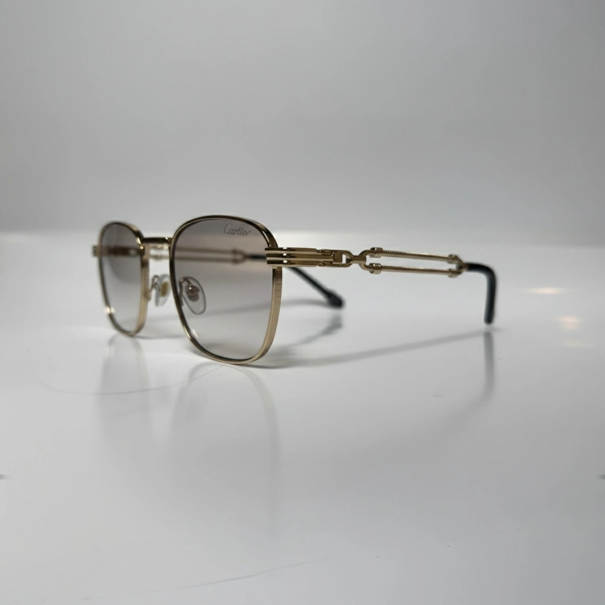 The ‘Mounir’ Rectangle Sunglasses | Transparent & Gold