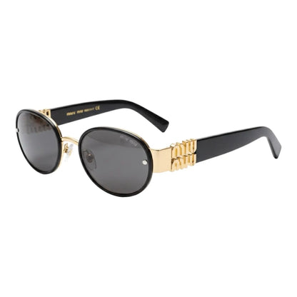 Sunglasses with gold frame and black lenses on a white background