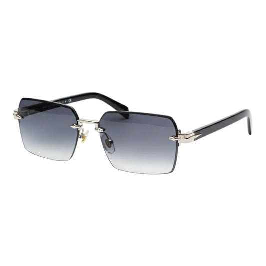 Sunglasses with black gradient lenses and gold frame on a white background