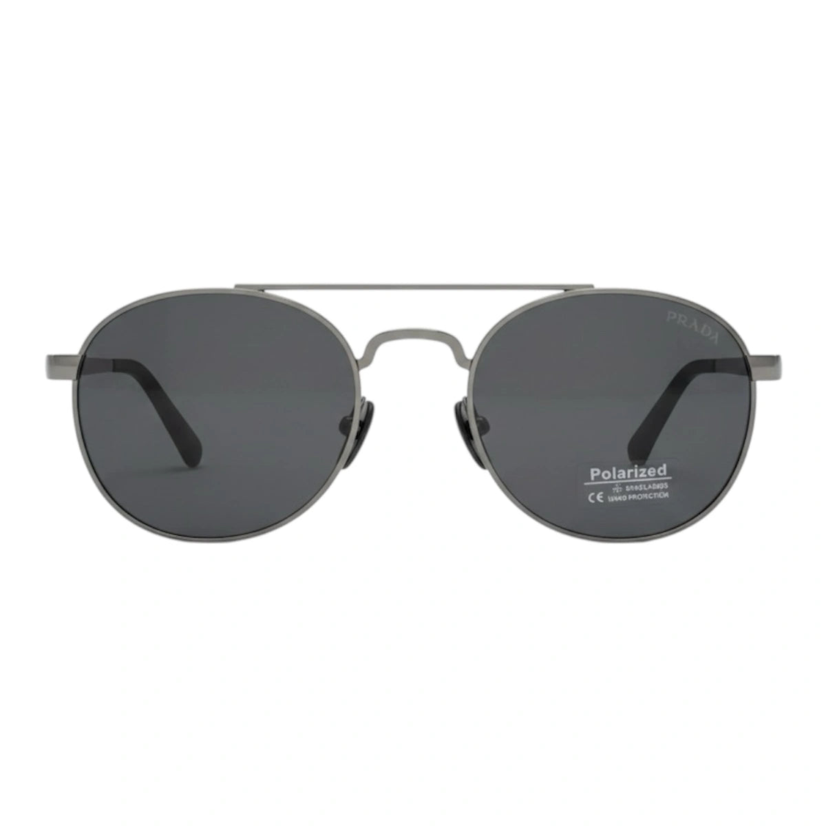 Sunglasses with dark lenses and metal frame on a white background
