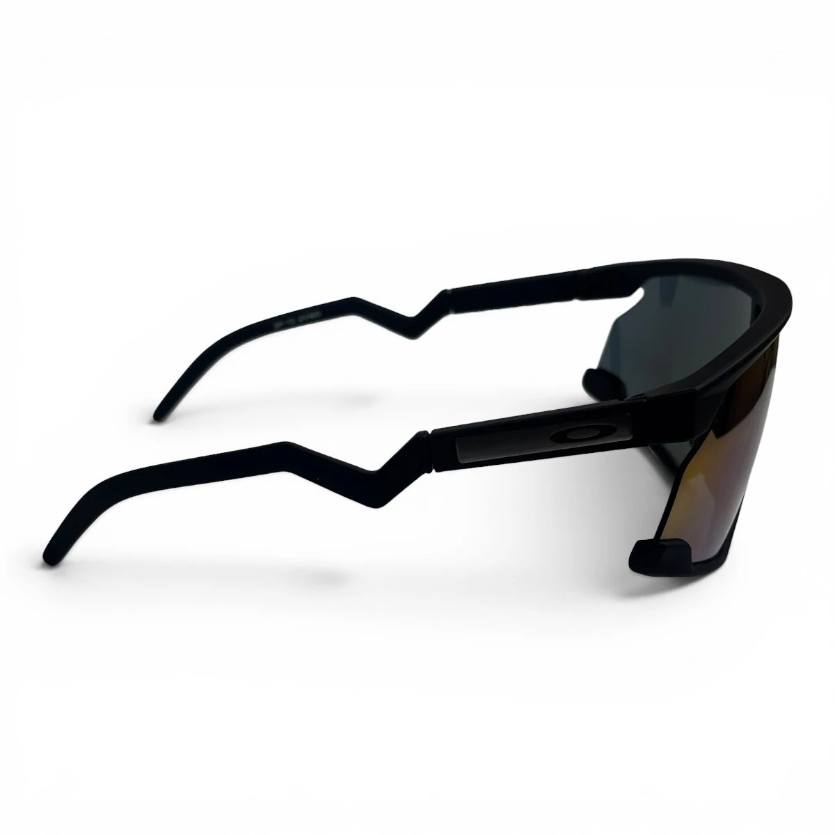 The Aero Sport Shield sunglasses in Black with Blue Purple Mirror lenses, side profile view