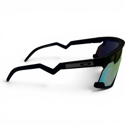 The Aero Sport Shield sunglasses in Black with Red Yellow Mirror lenses, side profile view