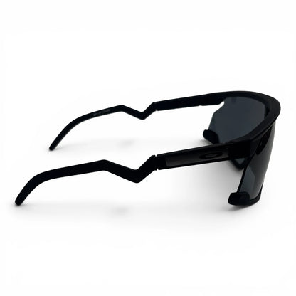 The Aero Sport Shield sunglasses in Black with Smoke lenses, side profile view
