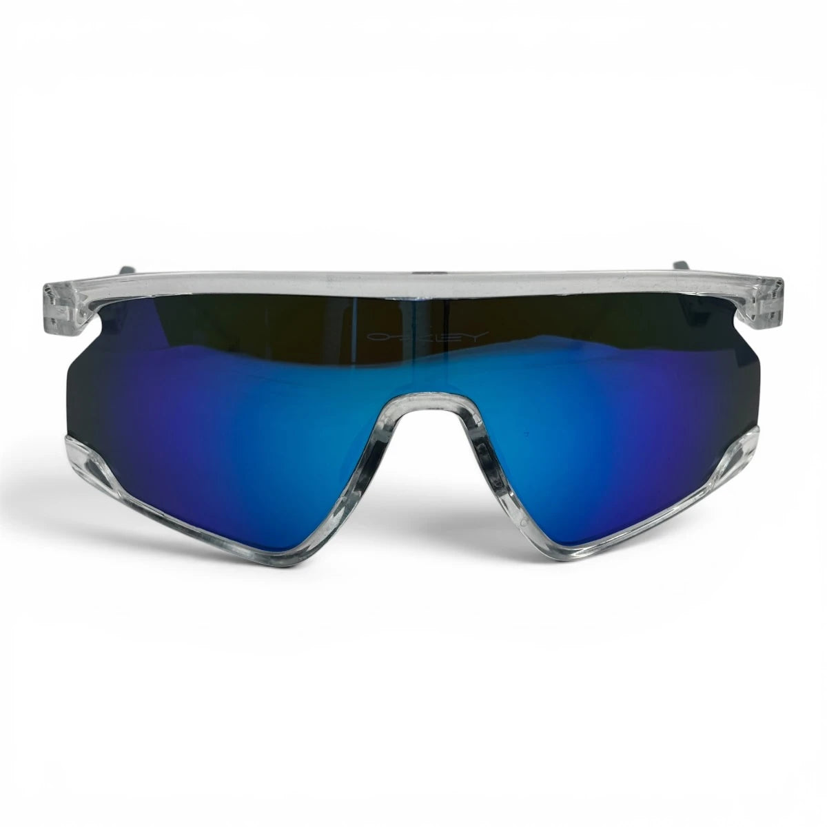 The Aero Sport Shield sunglasses in Clear with Blue Mirror lenses, angled three-quarter view