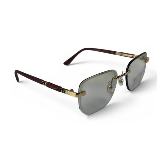 The Auren Rimless Geometric sunglasses in Gold Brown with Light Green lenses, angled three-quarter view