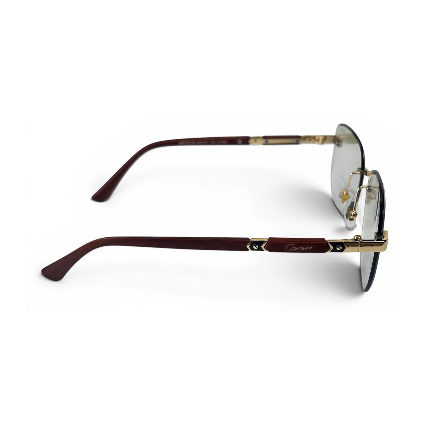The Auren Rimless Geometric sunglasses in Gold Brown with Light Green lenses, side profile view