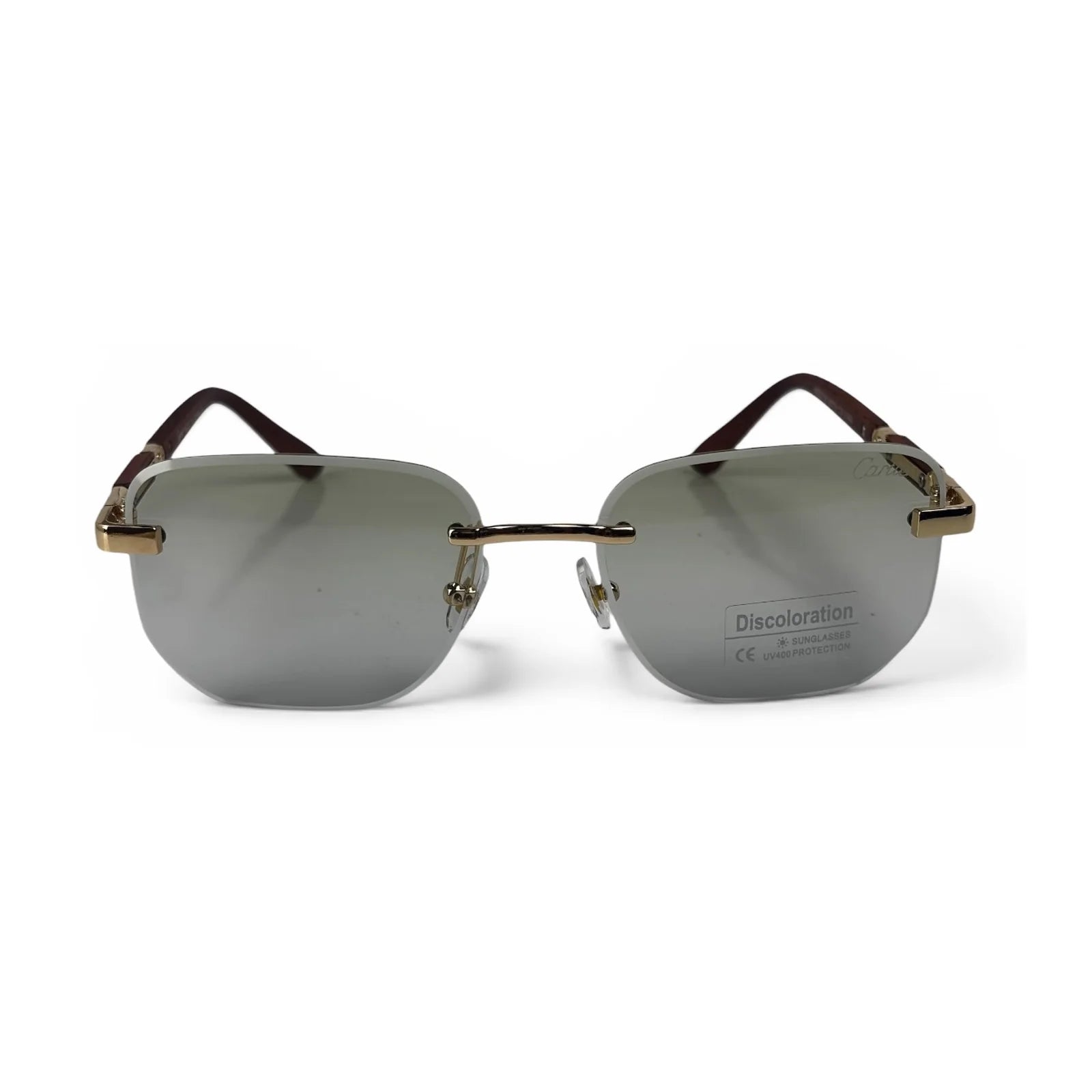 The Auren Rimless Geometric sunglasses in Gold Brown with Light Green lenses, straight front view