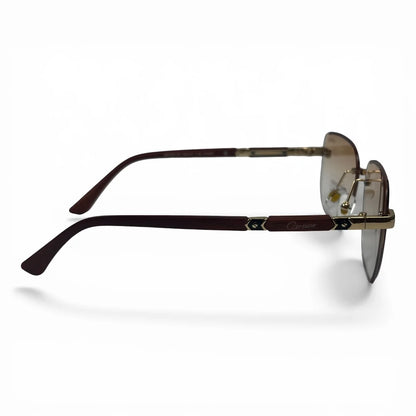 The Auren Rimless Geometric sunglasses in Gold Burgundy with Champagne Gradient lenses, side profile view