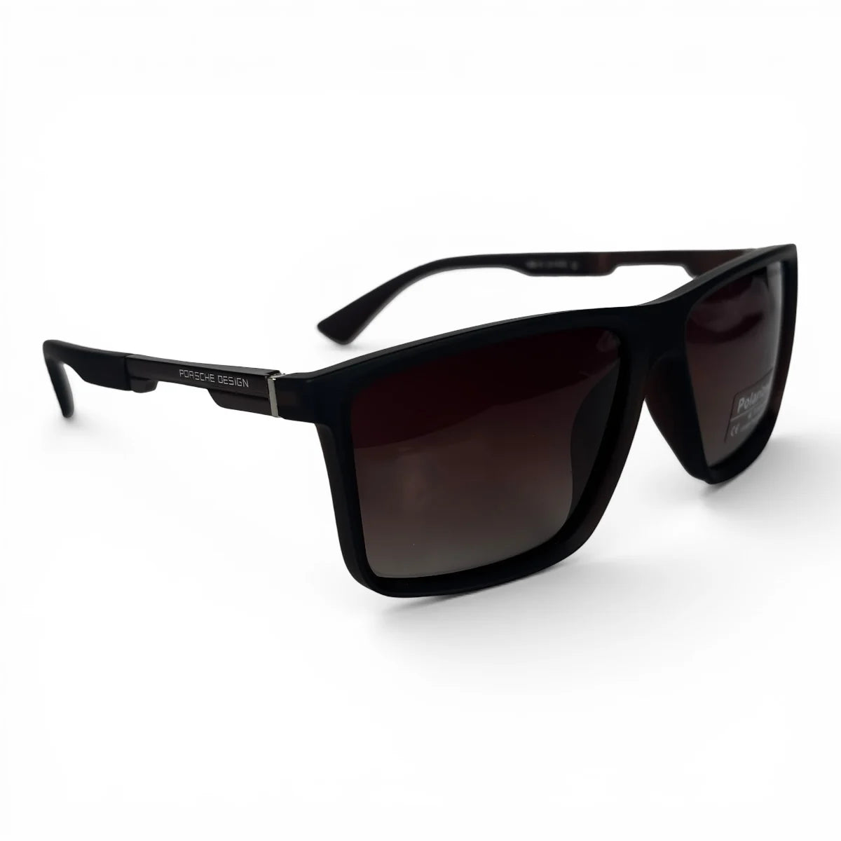 The Axiom Rectangle sunglasses in Black with Brown Gradient lenses, angled three-quarter view
