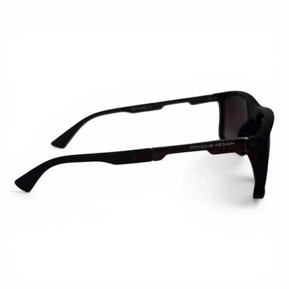 The Axiom Rectangle sunglasses in Black with Brown Gradient lenses, side profile view