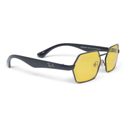 U&EYE The Caelum hexagonal polarized sunglasses in Black / Yellow — angled view