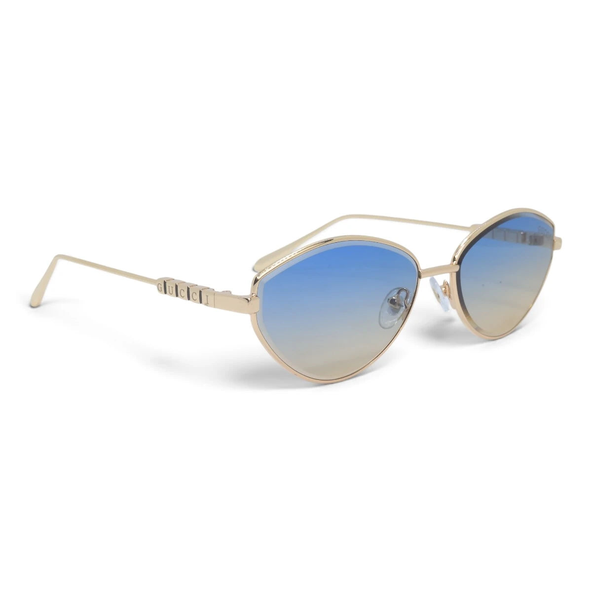 U&EYE The Elara soft cat-eye sunglasses in Gold / Blue-Gold Gradient — angled view