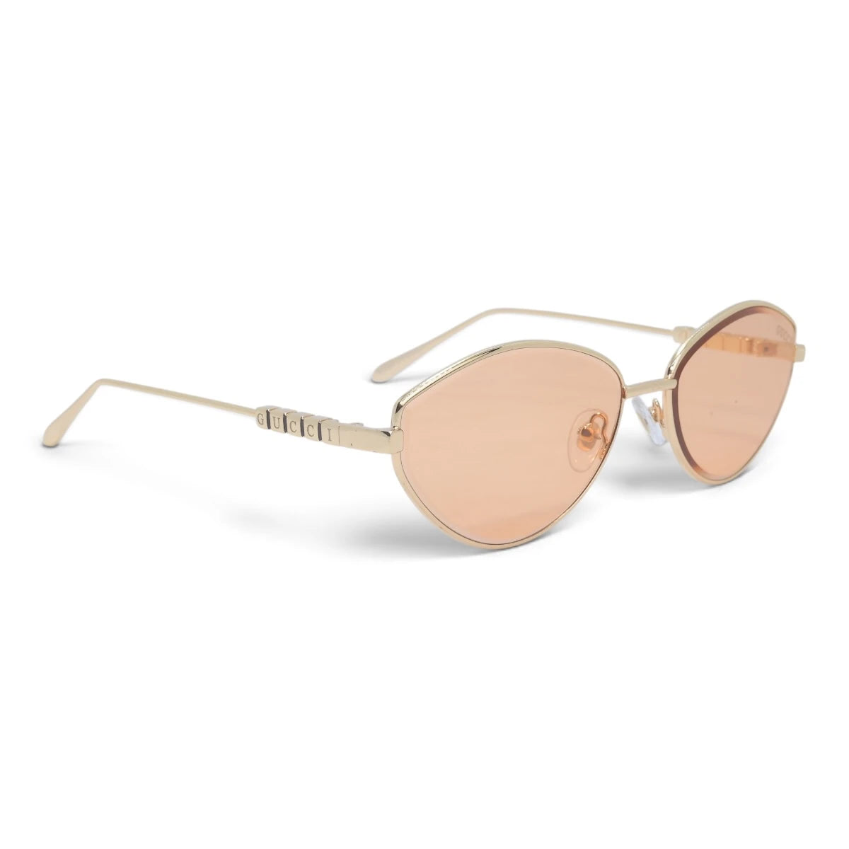 U&EYE The Elara soft cat-eye sunglasses in Gold / Peach Rose — angled view
